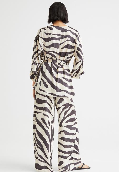H&M - Wide trousers - cream/zebra print