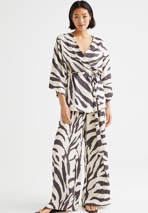 H&M - Wide trousers - cream/zebra print