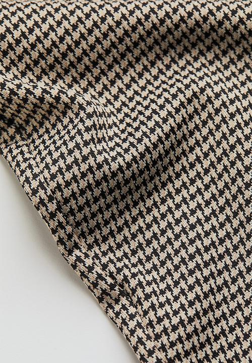 H&M - Flared leggings - beige/dogtooth-patterned