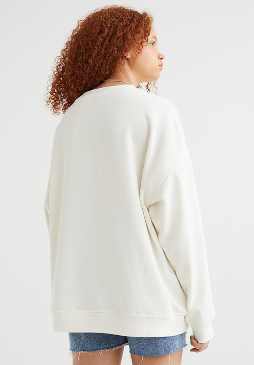 H&M - Oversized printed sweatshirt - cream/nirvana
