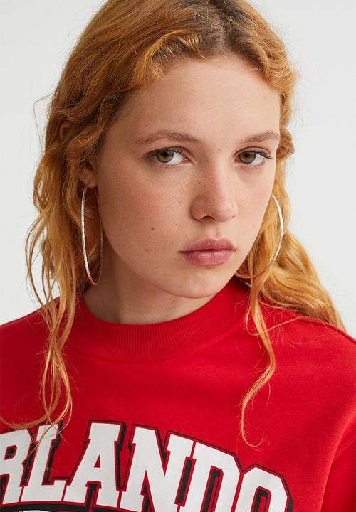 H&M - Printed sweatshirt - red/orlando