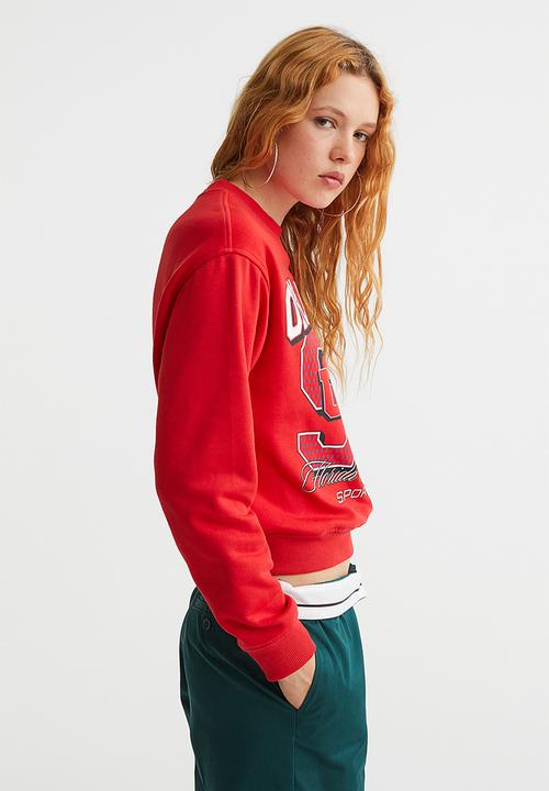 H&M - Printed sweatshirt - red/orlando