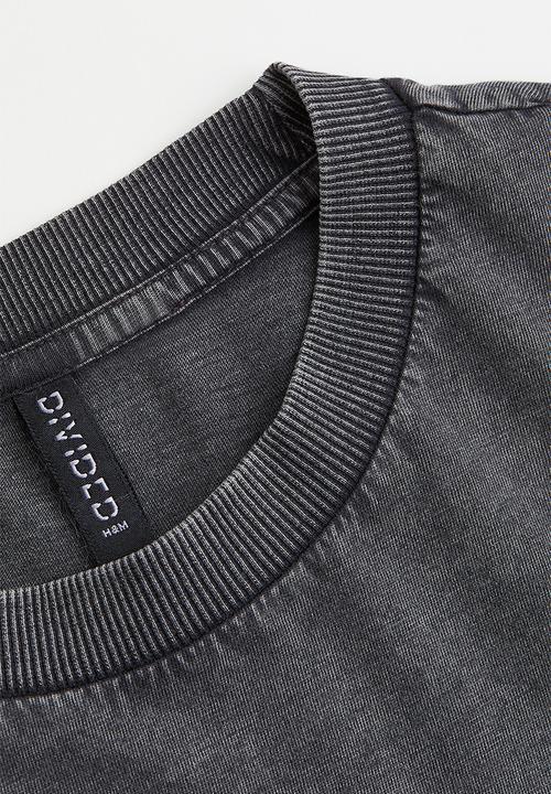 H&M - Oversized printed T-shirt - black/natures powers