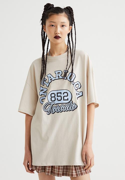 H&M - Oversized printed T-shirt - light beige/ontario
