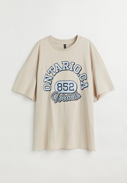 H&M - Oversized printed T-shirt - light beige/ontario