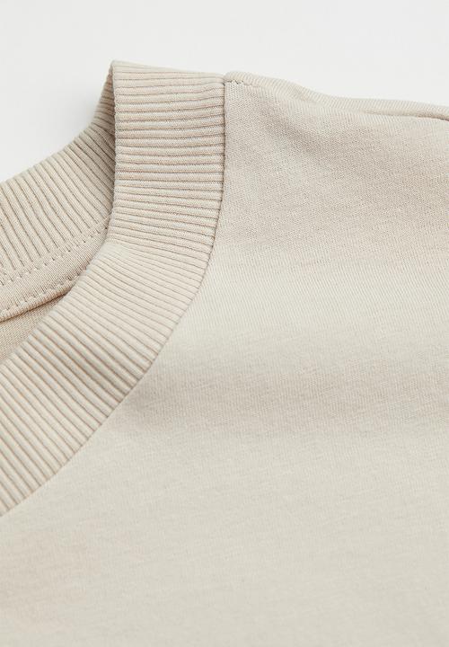 H&M - Oversized printed T-shirt - light beige/ontario