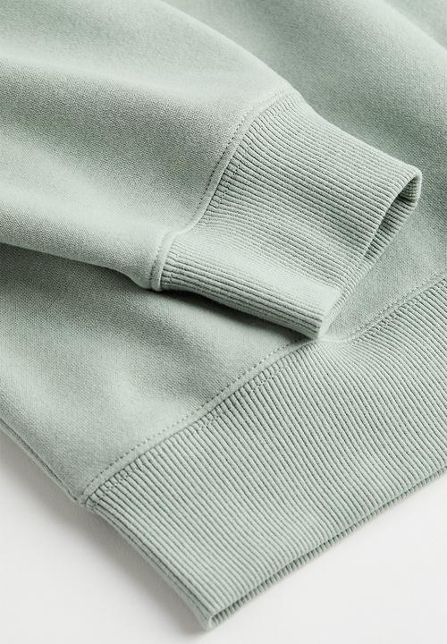 H&M - Printed sweatshirt - dusky green/harvard