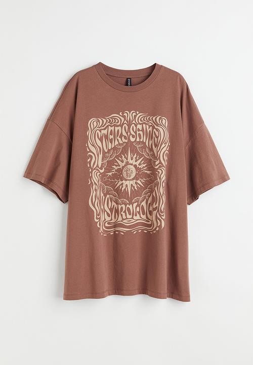 H&M - Oversized printed T-shirt - brown/stars shine