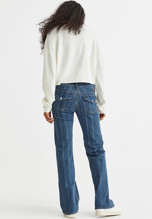 H&M - Flared low jeans - denim blue/striped