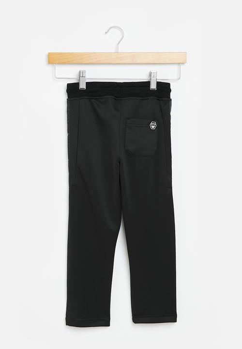 SOVIET - Track pants - black