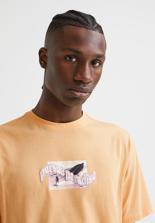 H&M - Printed T-shirt - yellow/pursue paradise
