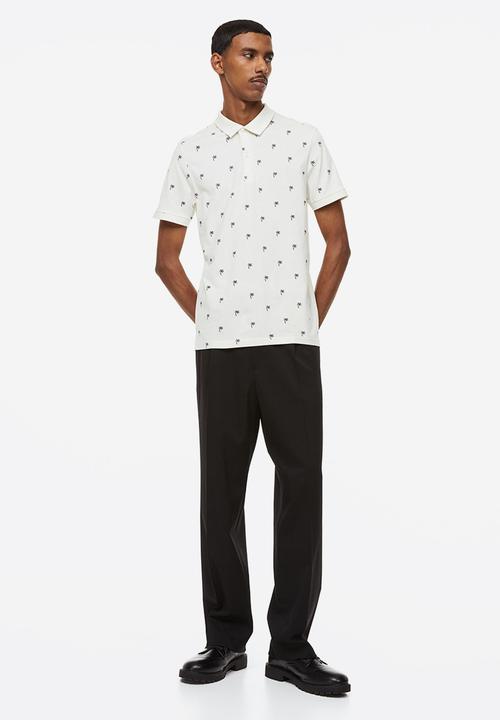 H&M - Slim fit patterned polo shirt - cream/palm trees