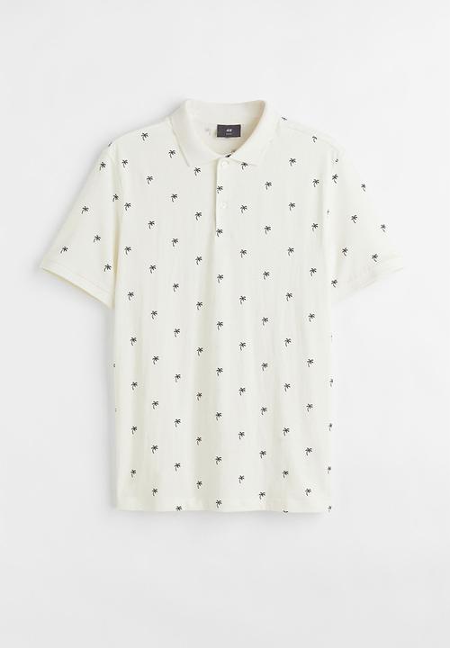 H&M - Slim fit patterned polo shirt - cream/palm trees