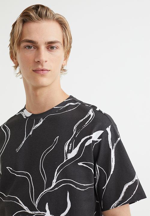 H&M - Relaxed fit patterned cotton T-shirt - black/patterned