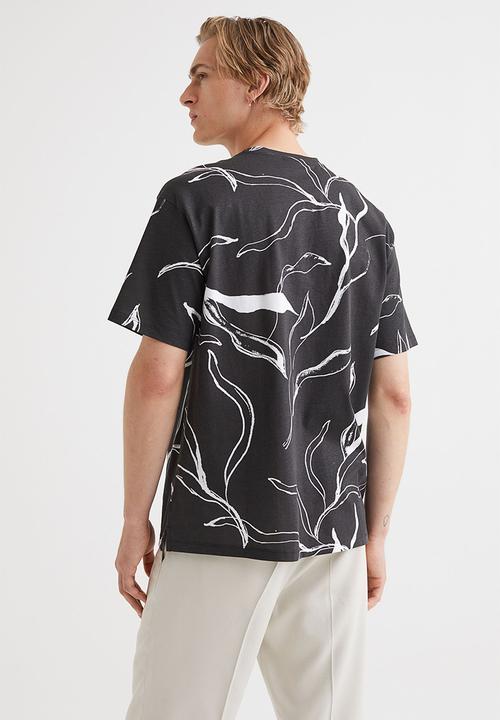 H&M - Relaxed fit patterned cotton T-shirt - black/patterned