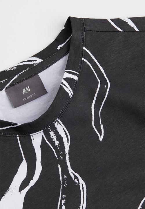H&M - Relaxed fit patterned cotton T-shirt - black/patterned