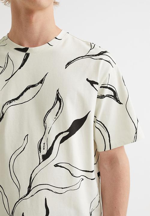 H&M - Relaxed fit patterned cotton T-shirt - cream/patterned
