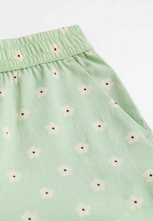 H&M - Wide trousers - mint green/floral