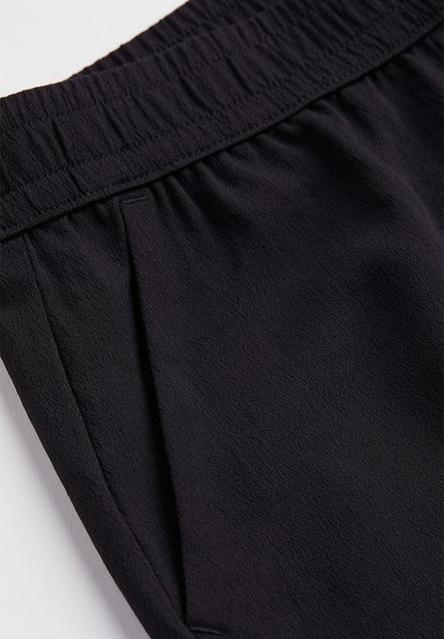H&M - Wide trousers - black