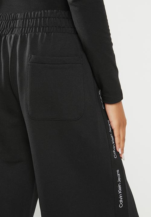 Calvin Klein - Logo tape wide leg jog pants - ck black