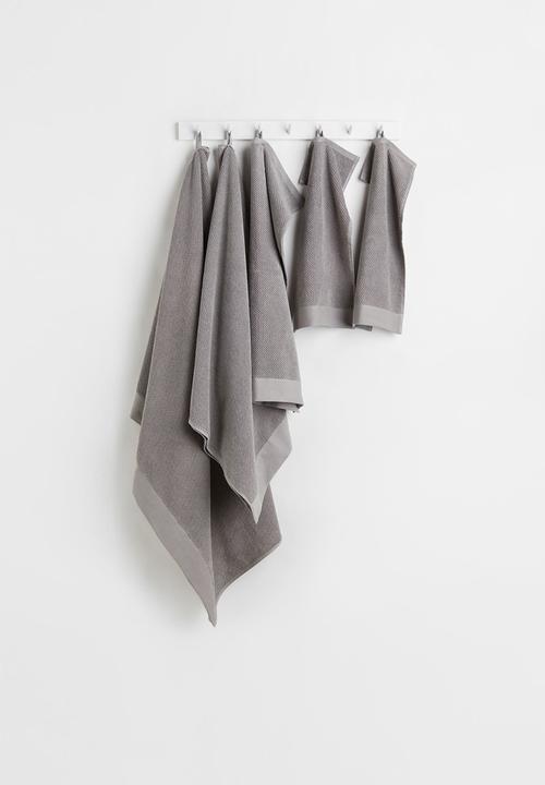 H&M - Cotton terry hand towel - grey
