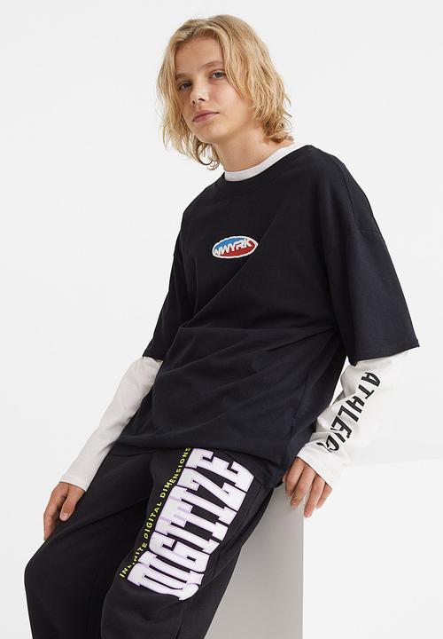 H&M - Wide joggers - black/digitize