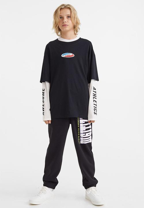 H&M - Wide joggers - black/digitize