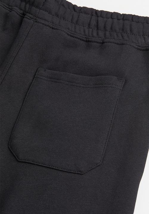 H&M - Wide joggers - black/digitize