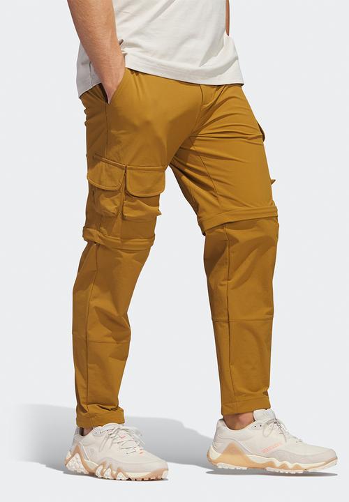 adidas Performance - Adicross zip-off golf pants - bronze strata