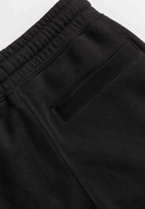 H&M - Printed joggers - black/playstation