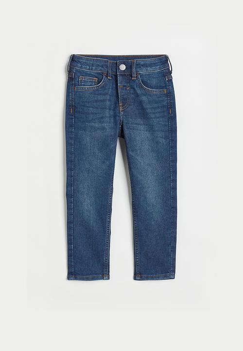 H&M - Superstretch relaxed tapered fit jeans - dark denim blue