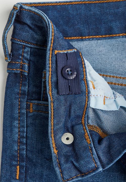 H&M - Superstretch relaxed tapered fit jeans - dark denim blue