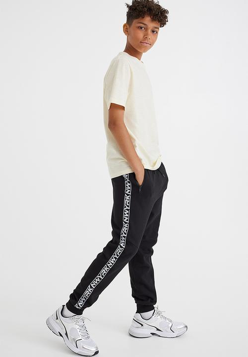 H&M - Joggers - black/nwyrk
