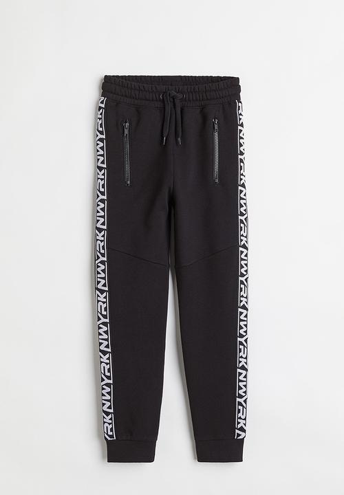 H&M - Joggers - black/nwyrk