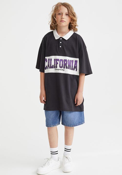 H&M - Printed polo shirt - black/california