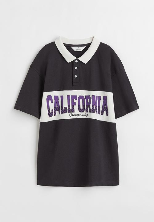 H&M - Printed polo shirt - black/california
