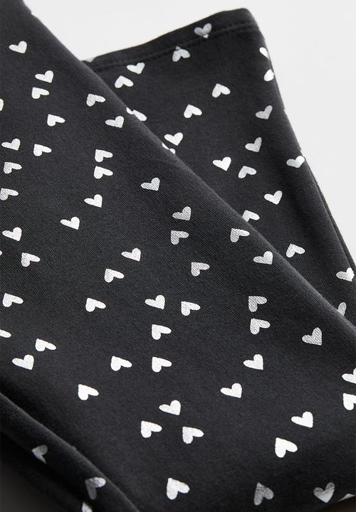 H&M - Flared leggings - black/hearts