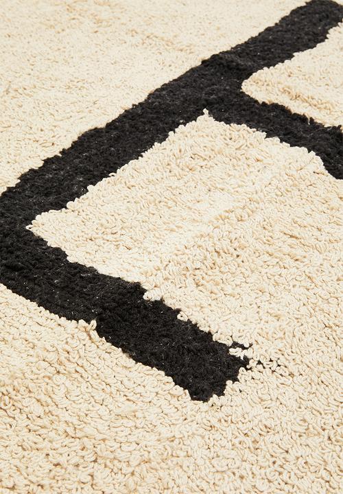 H&S - Linear cut settle tufted rug - natural & black
