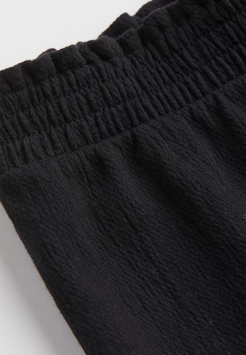 H&M - Crinkled jersey trousers - black