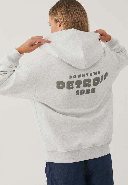 Supré  - Paige oversized printed hoodie - light grey marle/detroit
