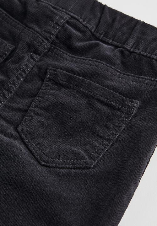 H&M - Flared corduroy trousers - black