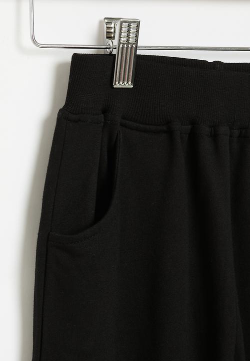 Pop Candy - Dino sweatpants - black & orange