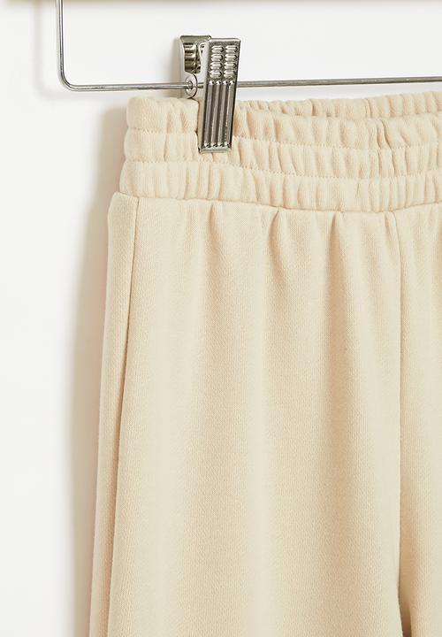 SISSY BOY - Alpha and omega: track pants  - stone