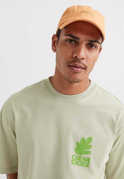 H&M - Relaxed fit printed T-shirt - light pistachio green/bird