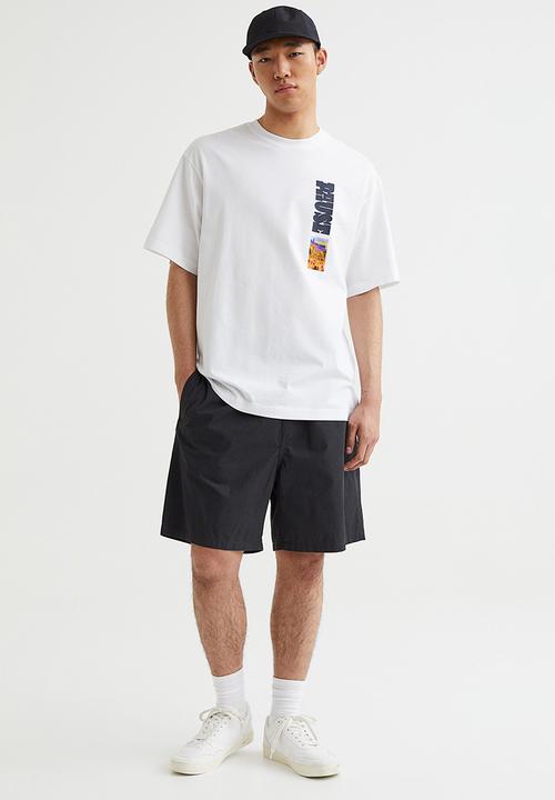H&M - Relaxed fit cotton T-shirt - white/pause