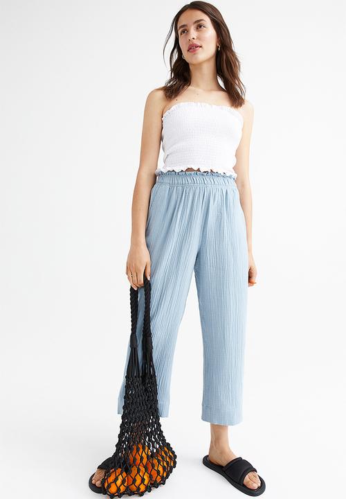 H&M - Crinkled cotton trousers - light blue