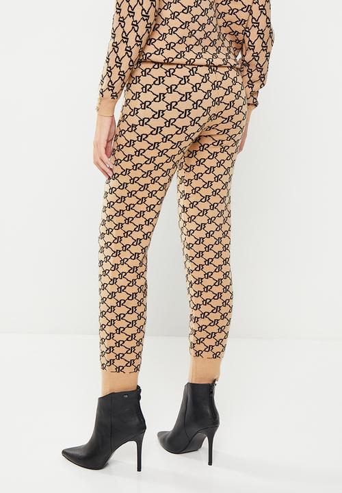 SISSY BOY - Willema fitted, ankle-length sweatpants - stone & black