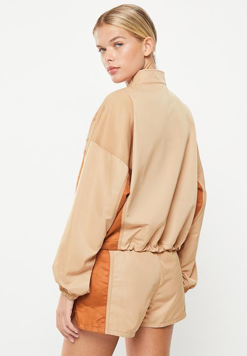 PUMA - Infuse woven jacket - dusty tan