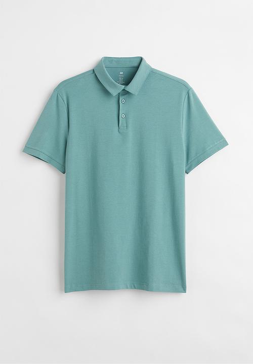 H&M - Slim fit polo shirt - turquoise