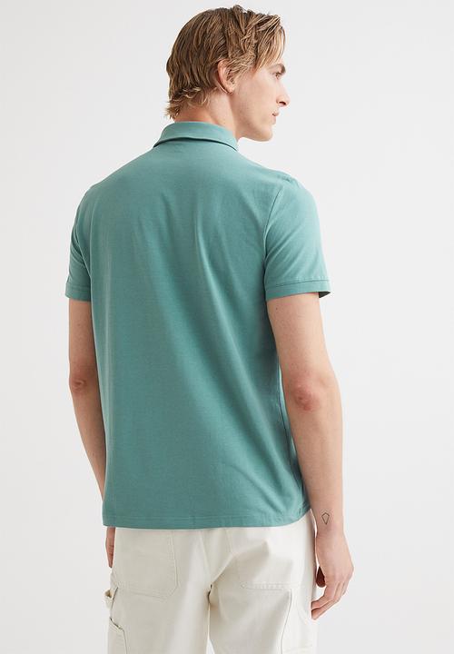 H&M - Slim fit polo shirt - turquoise